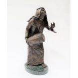An Anne Rooney bronze figure of Arab man on marble base, 36cm tall