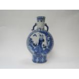 A late 18th/early 19th Century moon flask blue and white decoration with character marks to base,