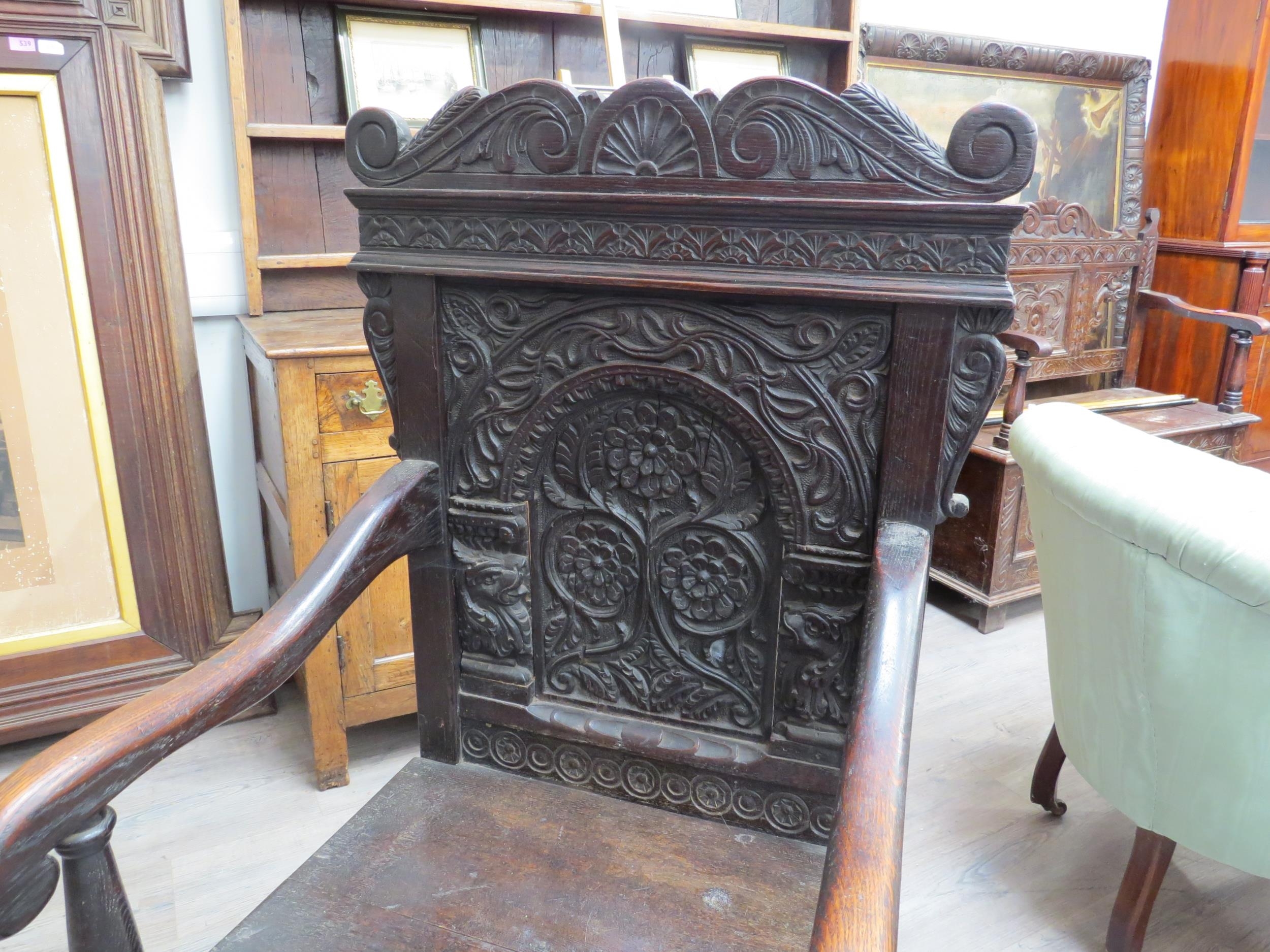 A 17th Century and later Wainscot chair with scroll top and dragon detail, vine, leaf and flower - Image 3 of 5