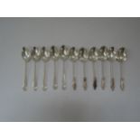 A set of six William Davenport silver apostle teaspoons, Birmingham 1894 and five William Aitken