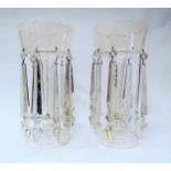 A pair of Victorian lustres with white enamel decoration, one drop missing, 34cm tall