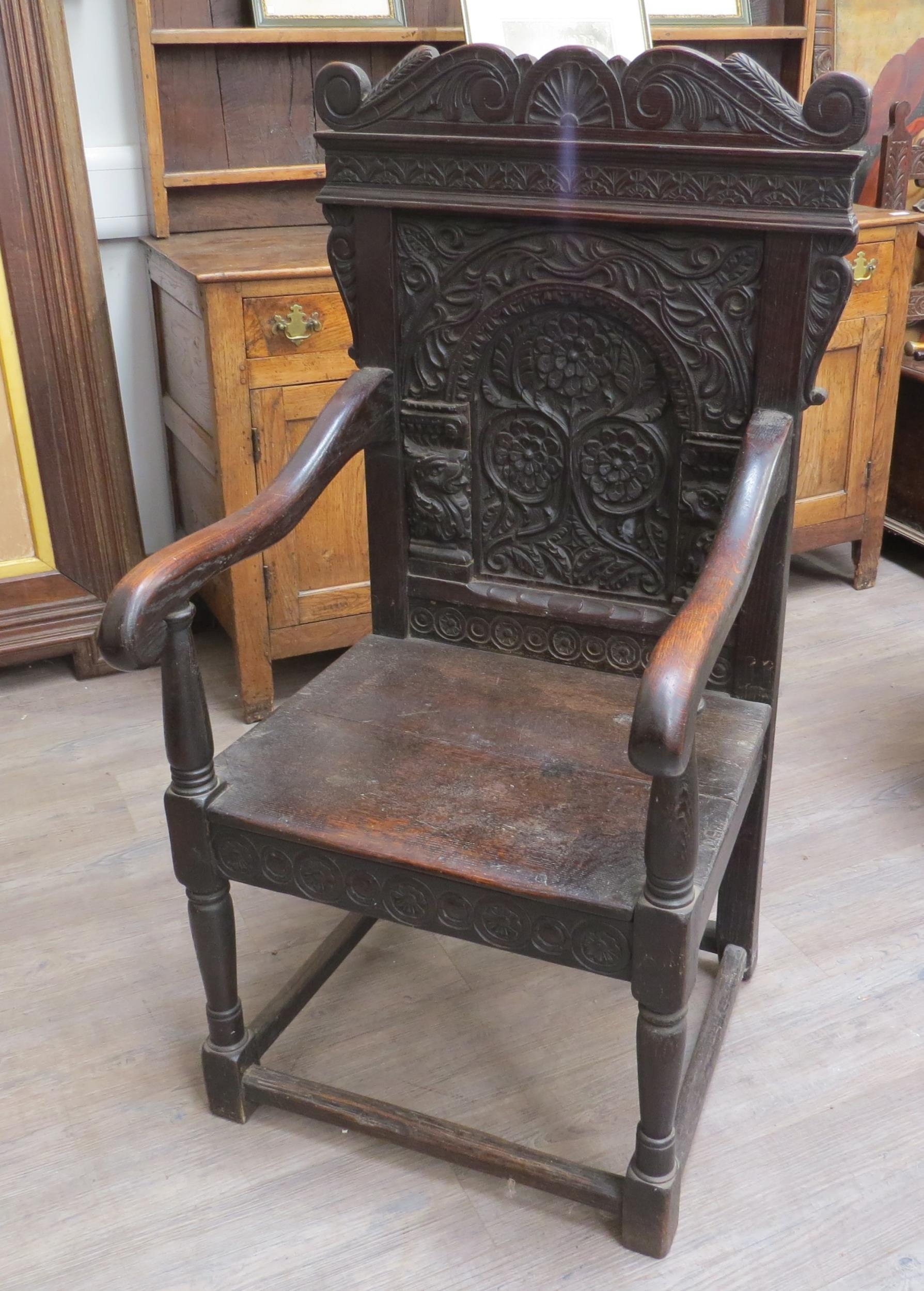 A 17th Century and later Wainscot chair with scroll top and dragon detail, vine, leaf and flower - Image 2 of 5