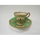 A Flight, Barr and Barr Worcester teacup and saucer Circa 1820, painted with vignettes and a crest