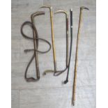 Five various Edwardian and later riding canes and whips. Three with antler handles