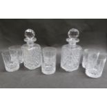 A pair of heavy cut glass whisky decanters, 22cm tall, and six tumblers (8)