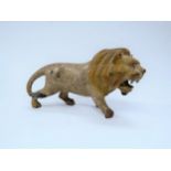 A 19th Century carved wood polychrome Lion figure, front feet a/f, 11cm tall x 21cm long