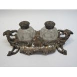 A John Harrison & Co. silver twin bottle desk stand of Rococo form, Sheffield 1870, 25cm long, the