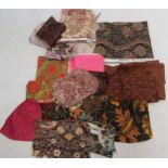 Three boxes containing dressmaking and furnishing remnants in various styles, colours, fabrics and
