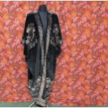 MARIANO FORTUNY - VENICE: An early 20th Century Venetian silk velvet evening coat in black bearing a