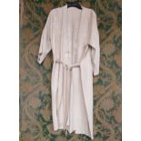 A Chinese cream silk grosgrain full length robe beautifully embroidered to the front and back with
