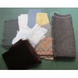 A box containing a selection of dress and tailoring cloths, various weights, colours and designs