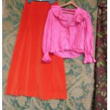 A 1960's/70's bubble gum pink silk blouse and a tangerine velvet full length skirt