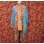 A mid Century Chinese short robe bearing a colourful bold design of flowers, sunbursts and clouds