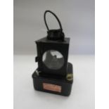 A black painted BR (E) signal lamp interior with metal burner, copper plaque stamped Haddiscoe