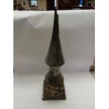 A cast iron signal post finial with wooden top