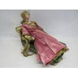 A Danbury Mint porcelain Sleeping Beauty character doll with associated chaise longue