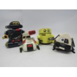 Four vintage Tomy battery powered plastic robots to include Mr DJ, Spotbot, Mr Money and Dingbot (4)