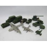 A collection of Dinky Toys military diecast vehicles to include 151b 6-Wheel Covered Wagon (x2),