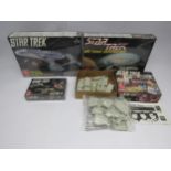Four boxed AMT / ERTL Star Trek plastic model kits comprising #6007 U.S.S. Enterprise Command