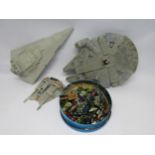 Three plastic model Star Wars spaceships to include Millenium Falcon, Star Destroyer and