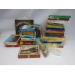 Assorted wooden and card jigsaw puzzles including Waddingtons 'Moonprobe', Victory etc. and two