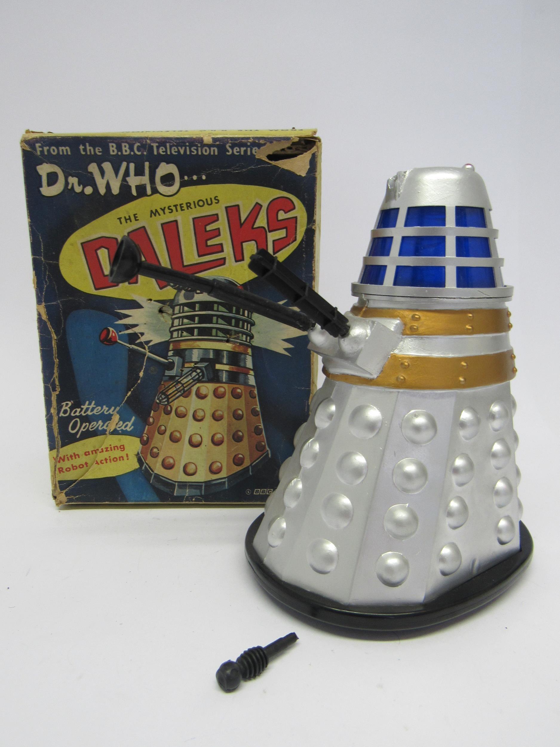 A boxed Louis Marx & Co 1964 Dr Who... The Mysterious Daleks battery operated silver plastic Dalek