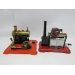 Two Mamod live steam stationary engines, each with brass horiziontal boiler, single cylinder and