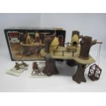 An original boxed Palitoy Star Wars Return Of The Jedi Ewok Village Action Playset together with