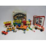 A collection of mixed vintage toys including Fisher Price Circus Train and Fire Engine, boxed
