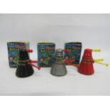 Three boxed 1960's Marx Toys Dr Who Dalek Rolykins in silver, red and black, each complete with eye,