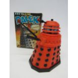 A boxed 1975 Palitoy BBC Dr Who Talking Dalek battery operated red plastic Dalek action figure,