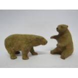 Two flock covered hollow cast lead figures of polar bears, tallest 5.5cm (2)