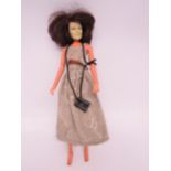 A 1979 Mego Corp. Dr Holly Goodhead doll from James Bond Moonraker, in associated outifit, head