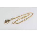 An 18ct gold neckchain hung with a 585 oriental charm, 4.8g total
