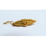 A 15ct gold brooch with anchor motif inscribed to back "Essex County" launched by Lilian Crabtree