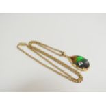 A 9ct gold belcher chain, 46cm long hung with an ammolite pear shaped pendant in 18k mount, 12g