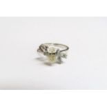 A Deco diamond ring with central pear shaped diamond 1.75ct approx with baguette cut diamond