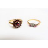 A 9ct gold garnet cluster ring and another, stone missing