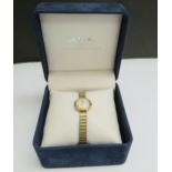 A 9ct gold cased Rotary wristwatch with adjustable bracelet strap, boxed