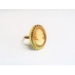 A 9ct gold cameo ring with pierced mount. Size L, 5.4g