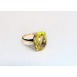 A gold citrine ring stamped 9ct. Size L, 4g