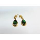 A pair of ammolite pear shaped drop earrings in 14k gold mount, 3.3g
