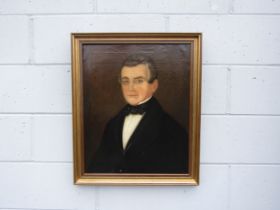 A mid to late 19th Century oil on canvas, portrait of a Gentleman wearing glasses. Unsigned work.