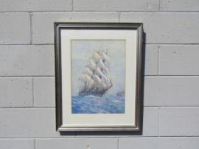 GREGORY ROBINSON (1876-1967) A framed and glazed watercolour of a three mast ship under sail. Signed