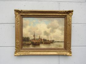 ROBERT BAGGE-SCOTT (1849-1925) An ornate framed oil on canvas, Dutch Barges on canal in Rotterdam.