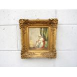 A 19th Century ornate gilt framed watercolour of a mother and her two children, unsigned, label