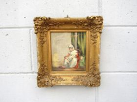 A 19th Century ornate gilt framed watercolour of a mother and her two children, unsigned, label