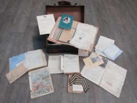A small suitcase containing ephemera of Derek Exell, some of his diaries including his time at Great