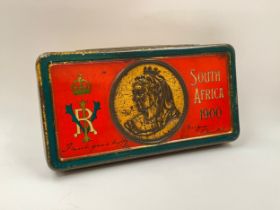 A South Africa 1900 gift tin with original chocolate contents, together with an embroidered silk