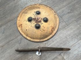 An Indian Dhal shield, circular form with four steel mounts, traces of leather covering present,